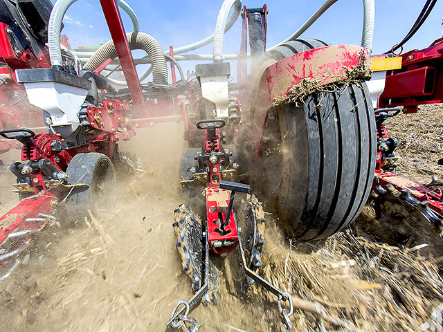 Implement tires are the workers in the trenches carrying planters, tillage tools and other heavy machines. (Photo courtesy of AGCO)